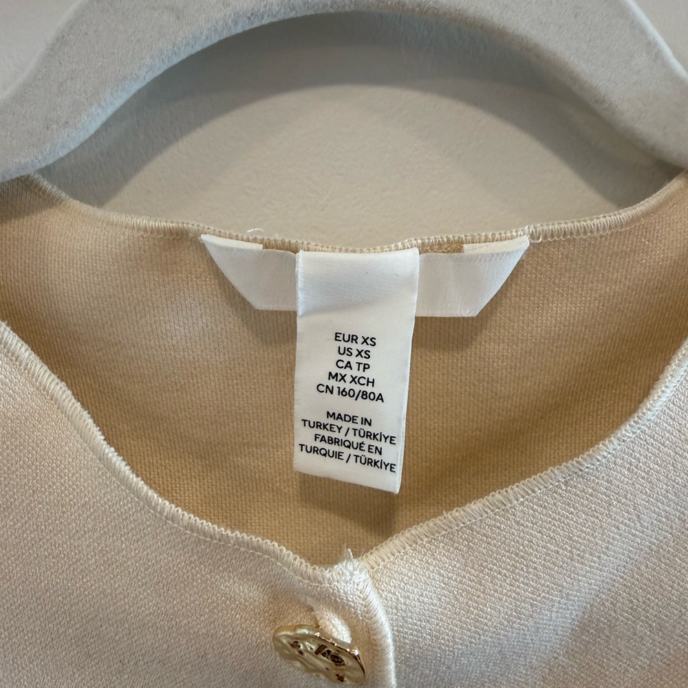 Elegant Cream Cardigan with Gold Button